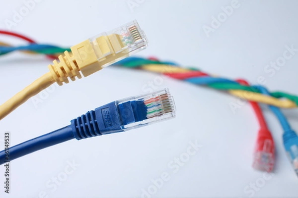 Obraz Network Ethernet Cables. Network switch with optical and ethernet connected wires.