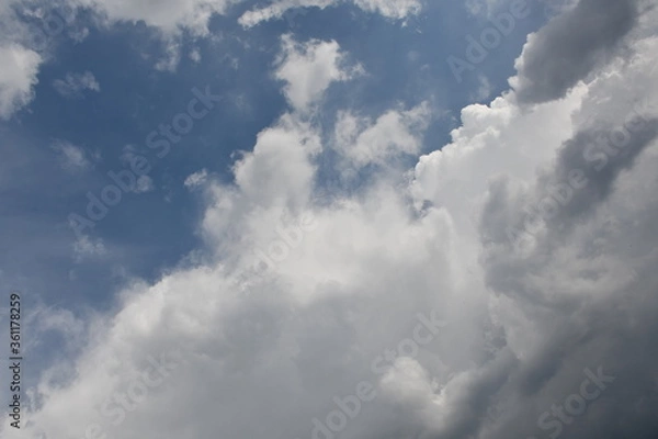 Obraz Beautiful white fluffy clouds on a blue sky