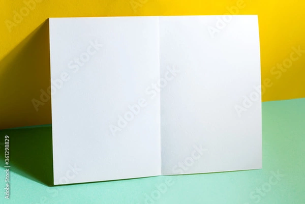 Fototapeta Folded bifold business white card mockup with shadows