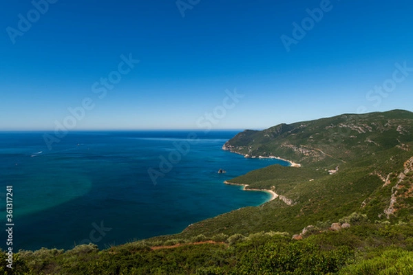 Fototapeta Scenic view of a bay with boats at the Arrabida Natural Park near Setubal, Portugal; Concept for summer vacations and travel in Portugal