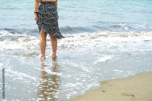 Fototapeta 女性と海