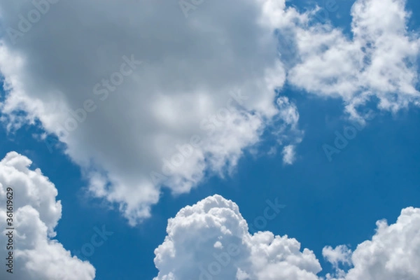 Obraz Clouds in blue sky background with copy space