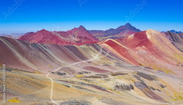 Obraz Aerial landscape of The Red Valley at Rainbow Mountain (Vinicunca Valley). Apu Ausangate is behind. Mountain full of colors. Cusco Region, Peru