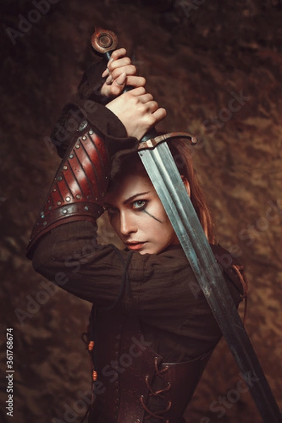 Obraz Beautiful woman fighting with sword