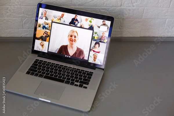 Obraz Business Person Videoconferencing With Colleagues On Laptop