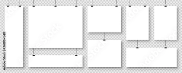 Obraz Realistic blank paper sheets hanging on binder clip. White vector poster with shadow in A4 format. Design template, mockup.