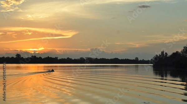 Fototapeta sunset over the river