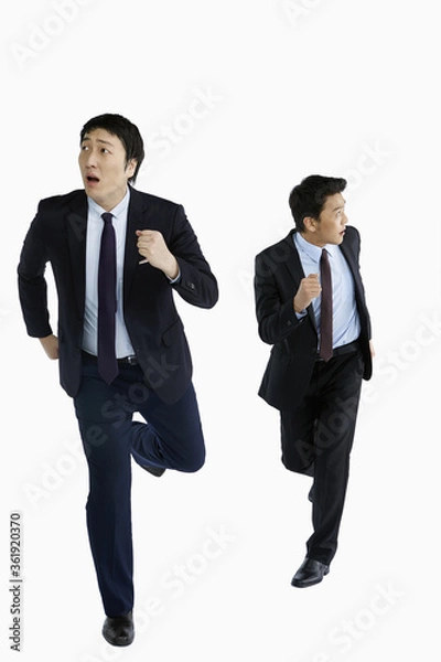 Obraz Two businessmen on the run