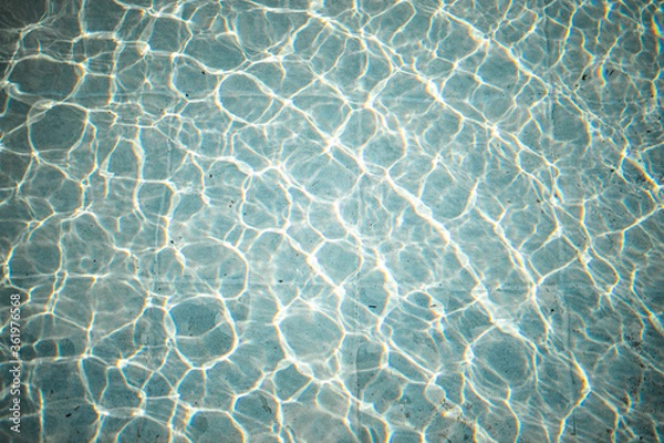 Fototapeta pool with sun reflections