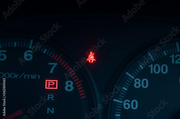 Fototapeta Black speedometer from a close-up car and symbol inside the screen