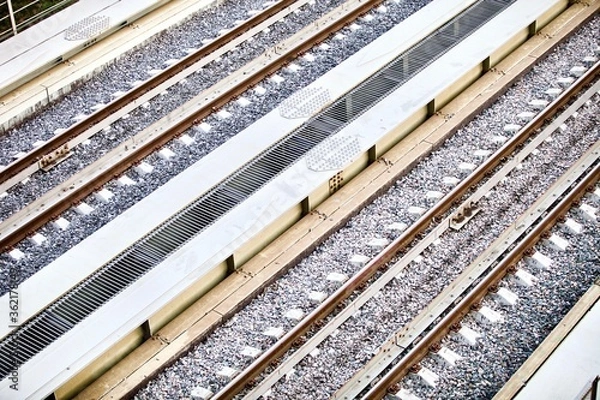 Fototapeta Railroad elements. Modern railways infrastructure. Railway transportation. railway transportation in the city. rails. Railroad tie. Straight Railways.