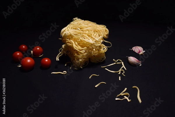 Fototapeta Still life in low key with black background.