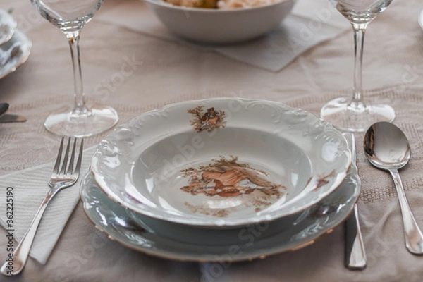 Fototapeta Restourant's table cutlery set with empty plate