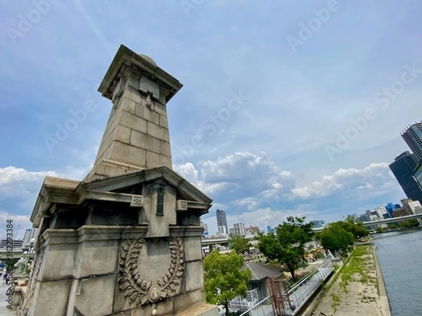 Fototapeta 街並み,市街地,ビル群,中之島,ビジネス街,大阪,青,青空,快晴,晴,風景,都市風景,都市,大都市,都会,都市イメージ,地方,地方都市,経済,社会,ビル,町並み,町,街,市街,晴れ,関西,雲,建物,空,日本,高層ビル,ビジネス,屋外,近畿,大都会,近畿地方,大阪府,青色,大阪市,地域,オフィス,関西地方,堂島,オフィスビル,タワービル