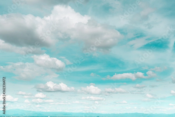 Fototapeta blue sky background with tiny clouds