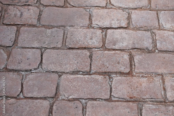 Fototapeta Concrete imprinted cobble driveway background