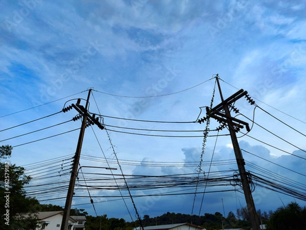 Fototapeta electric pole with blue sky background