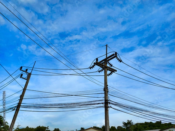 Fototapeta electric pole with blue sky background