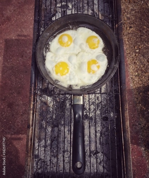 Obraz Eggs on a pan