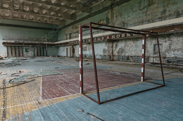 Fototapeta Playing field in gym in Prypiat, Chernobyl exclusion Zone. Chernobyl Nuclear Power Plant Zone of Alienation in Ukraine