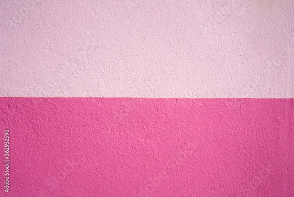 Fototapeta Abstract pink color of wall texture background with copy space for design and decoration. Two-tone background fashionable glamorous divided into two parts.