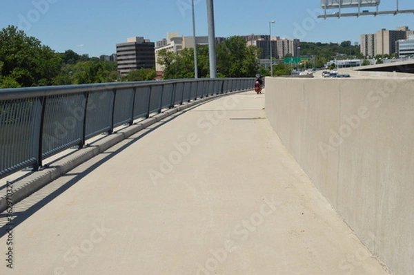 Obraz man walking on the bridge