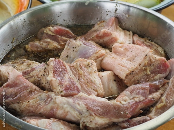 Fototapeta marinated in spices and sauce pieces of meat. pork kebab.