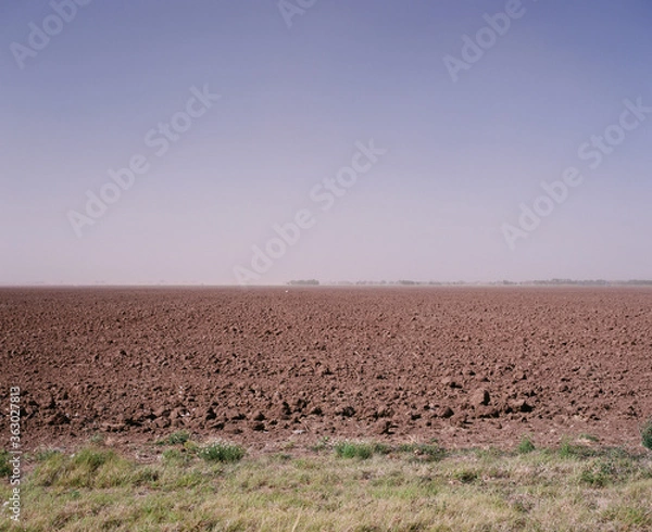 Fototapeta plowed field in autumn
