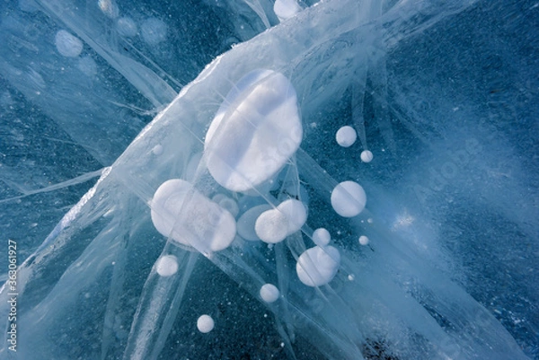 Fototapeta Beautiful ice of Lake Baikal with abstract cracks