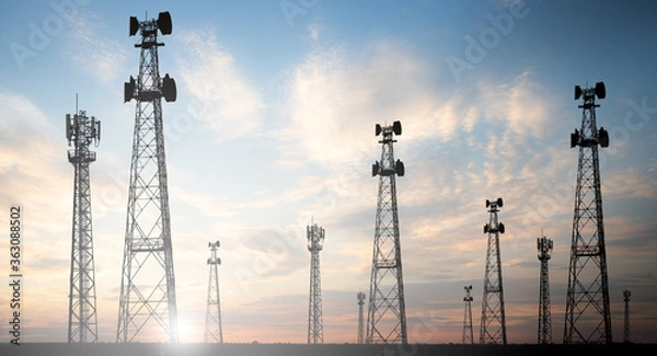 Obraz Telecommunication towers With a sunset background