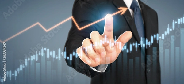 Fototapeta Businessman plan graph growth and increase of chart positive indicators