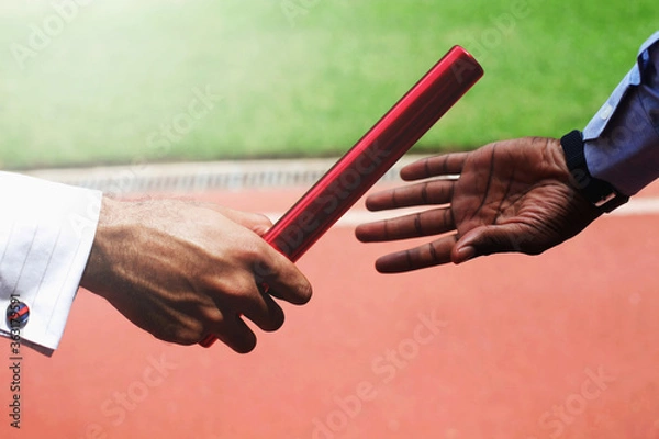 Obraz Businessmen passing baton
