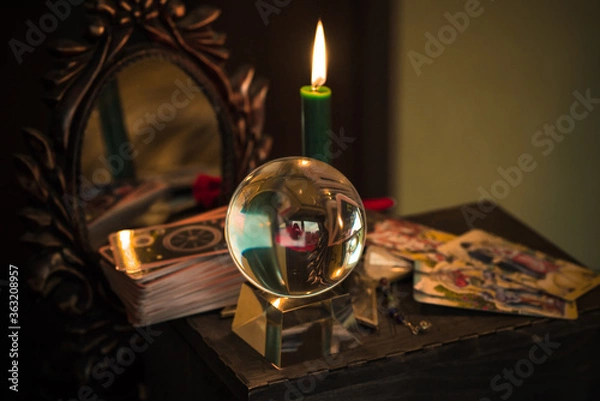 Obraz Magic crystal ball fortune teller ,love telling,  esoteric concept, mystical scene with candles, tarot cards on a table