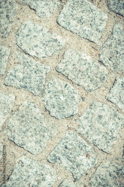 Fototapeta Footpath made of rocks or stones. Background texture