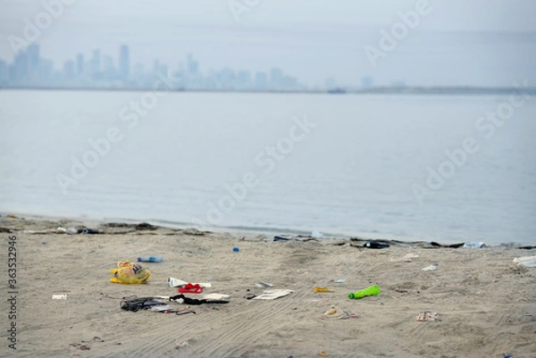 Obraz Garbage on the beach. Environmental pollution problem. Safe the planet  