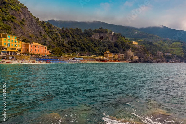 Fototapeta A view from the sea wall towards the beach at Monterosso al Mare, Italy in summer