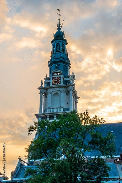 Obraz Church Tower at Sunset in Amsterdam, The Netherlands.