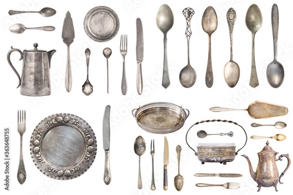 Obraz Vintage Silverware, antique spoons, forks, knives, ladle, cake shovels isolated on isolated white background. Antique silverware. Retro.