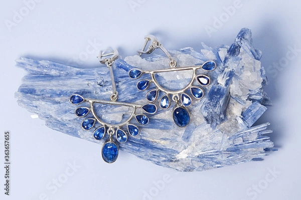 Obraz Jewelry earrings with kyanite or distin mineral from Brazil. Blue aluminosilicate mineral with columnar crystals and metamorphic rock. Called two forces.
