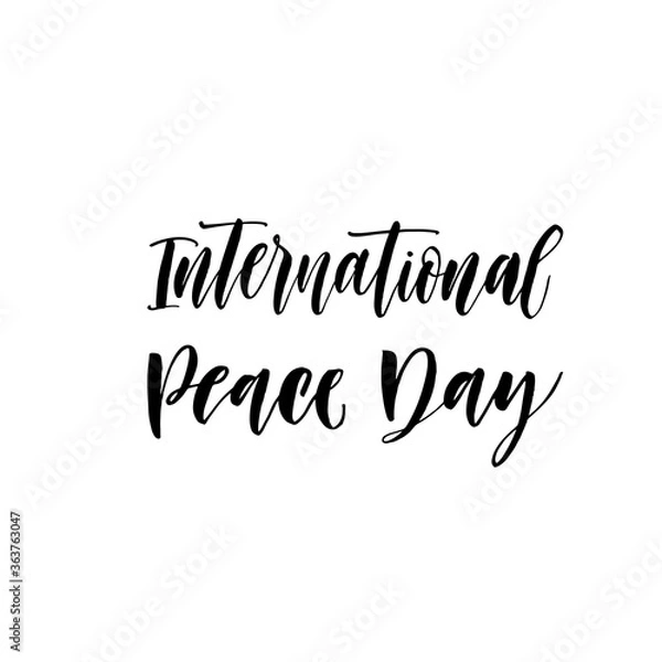 Fototapeta International Peace Day ink brush vector lettering. Modern slogan handwritten vector calligraphy. Black paint lettering isolated on white background. Postcard, greeting card, t shirt decorative print.