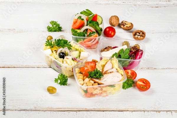 Fototapeta Several types of salads in plastic containers