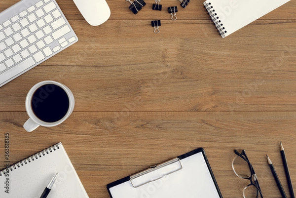 Fototapeta Flat lay, top view wooden office desk Workspace