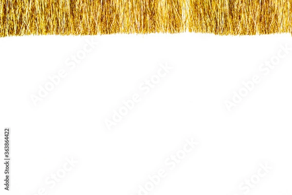 Fototapeta Golden christmas tinsel with empty space for your text. Copy space