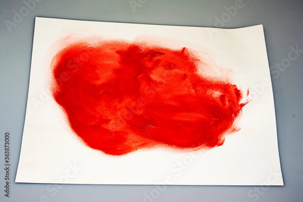 Obraz blurred red paint on paper