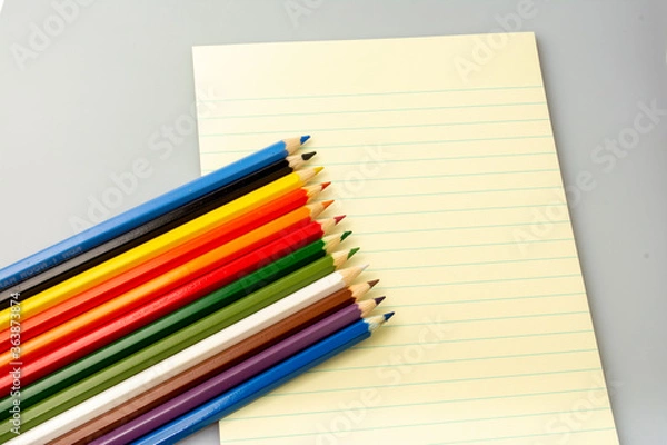 Obraz colored pencils and notebook