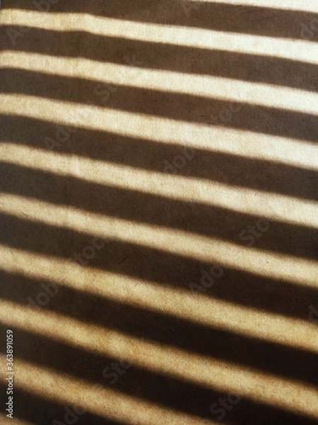 Fototapeta An abstract background with shadows.