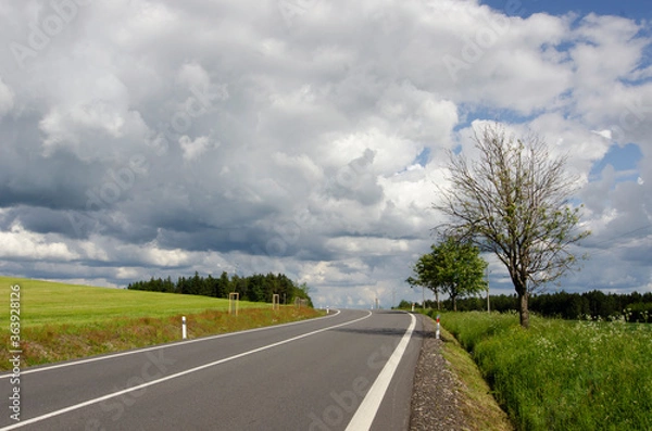 Obraz summer meadow and storm clouds