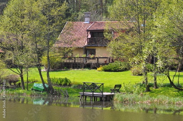 Obraz Dom nad rzeką.