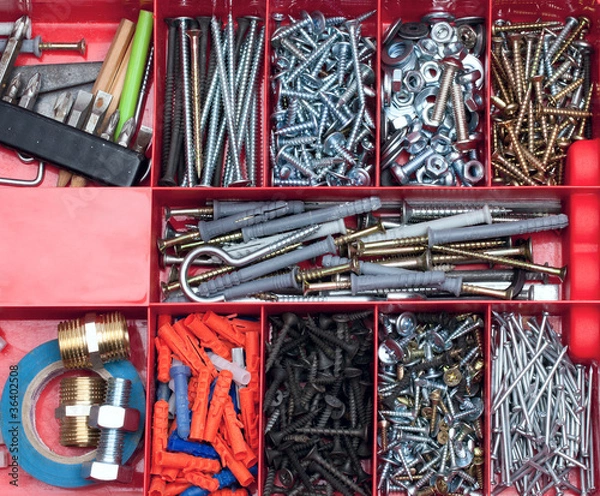 Obraz Fixing material in the red plastic boxes