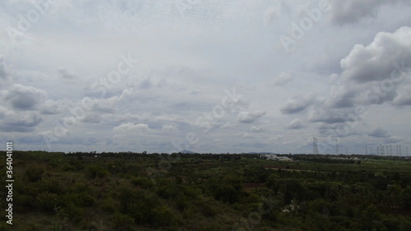 Obraz time lapse clouds over the river